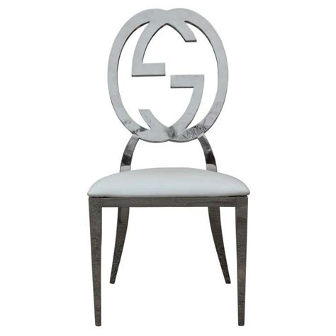 gucci dining table and chairs|best luxury armchairs.